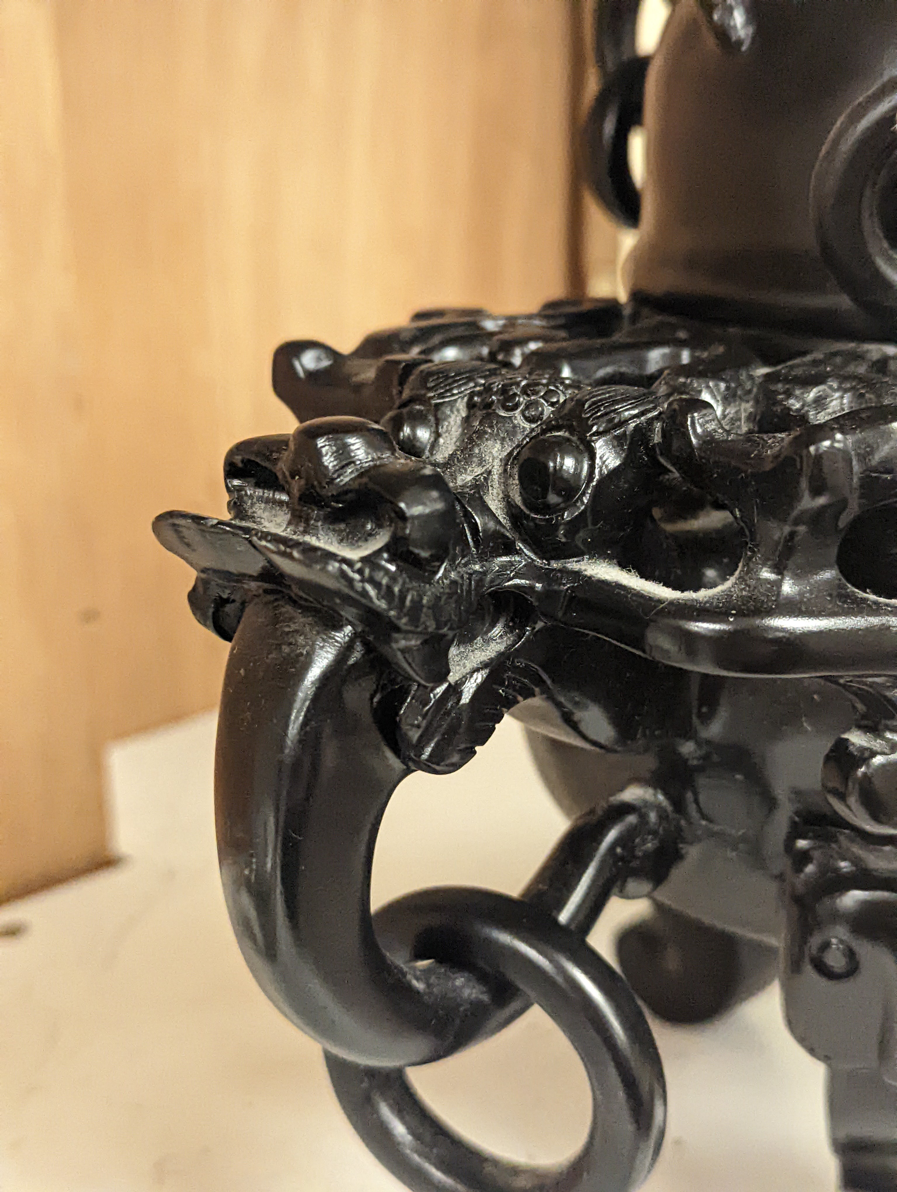 A large decorative Chinese black hardstone tripod censer and cover - 25.5cm high